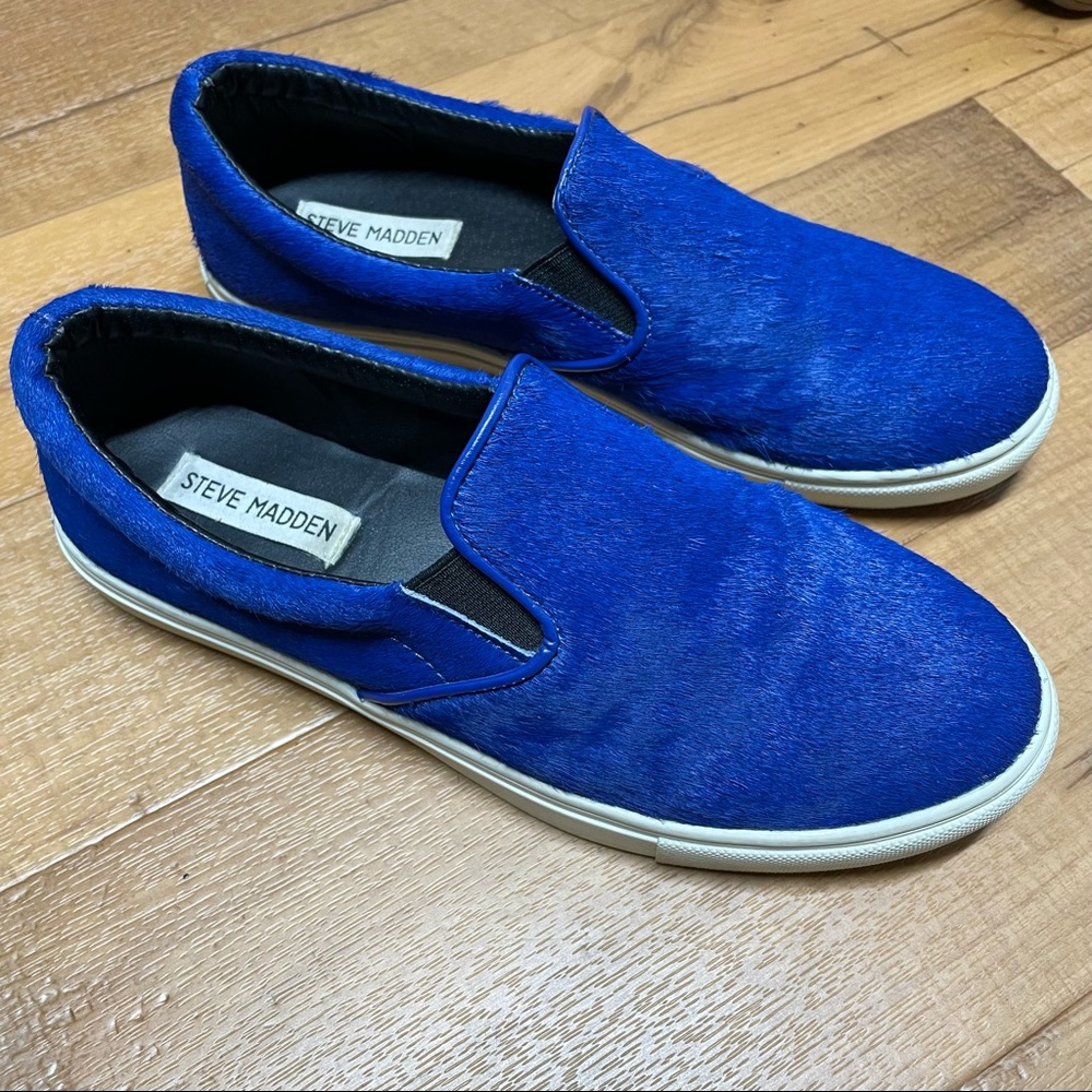 Size 9.5 Steve Madden Ecentric Blue Pony Hair Slip On Shoe they run small.